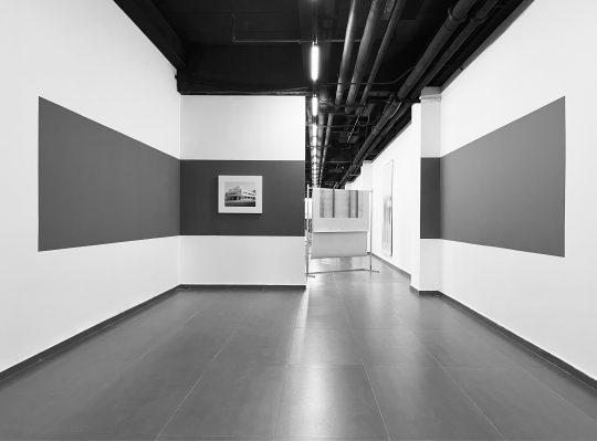 JOHN CORNU PLAN LIBRE, 2007 Black and white photographic document, wall painting [Site-specific architectural graft (5 pylons), Villa Savoye, Poissy ; Casing pipes, steel props and white paint] 60 x 70 cm Exhibition views "BAU", 27+, Hangzhou, China